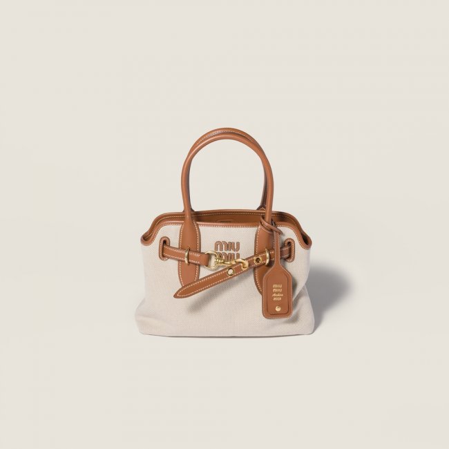 Miu Miu Aventure canvas and leather bag Beige / Brandy Miu Miu Aventure canvas and leather bag Beige / Brandy